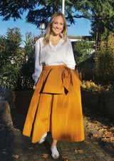 THEA BOW Gold - Midirock mit abnehmbaren Schleife